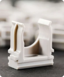 Divers prototypes fonctionnels et pièces finales illustrant les applications de l'impression 3D plastique