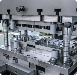 Progressive die metal stamping process for efficient production of thin-walled structural components