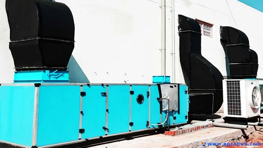 An industrial HVAC air handling unit, presented by EPTAHUB as a practical example of rivet application. The photo highlights how rivets are used to permanently join the large blue and black sheet metal panels in heavy-duty equipment.